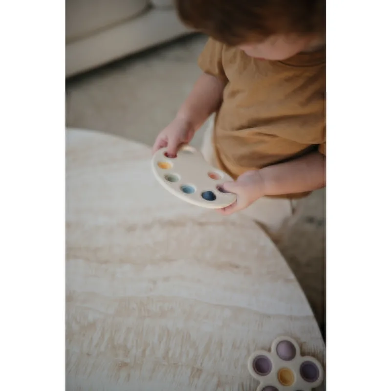 Zabawka sensoryczna Mushie Press Toy – Paleta Farb