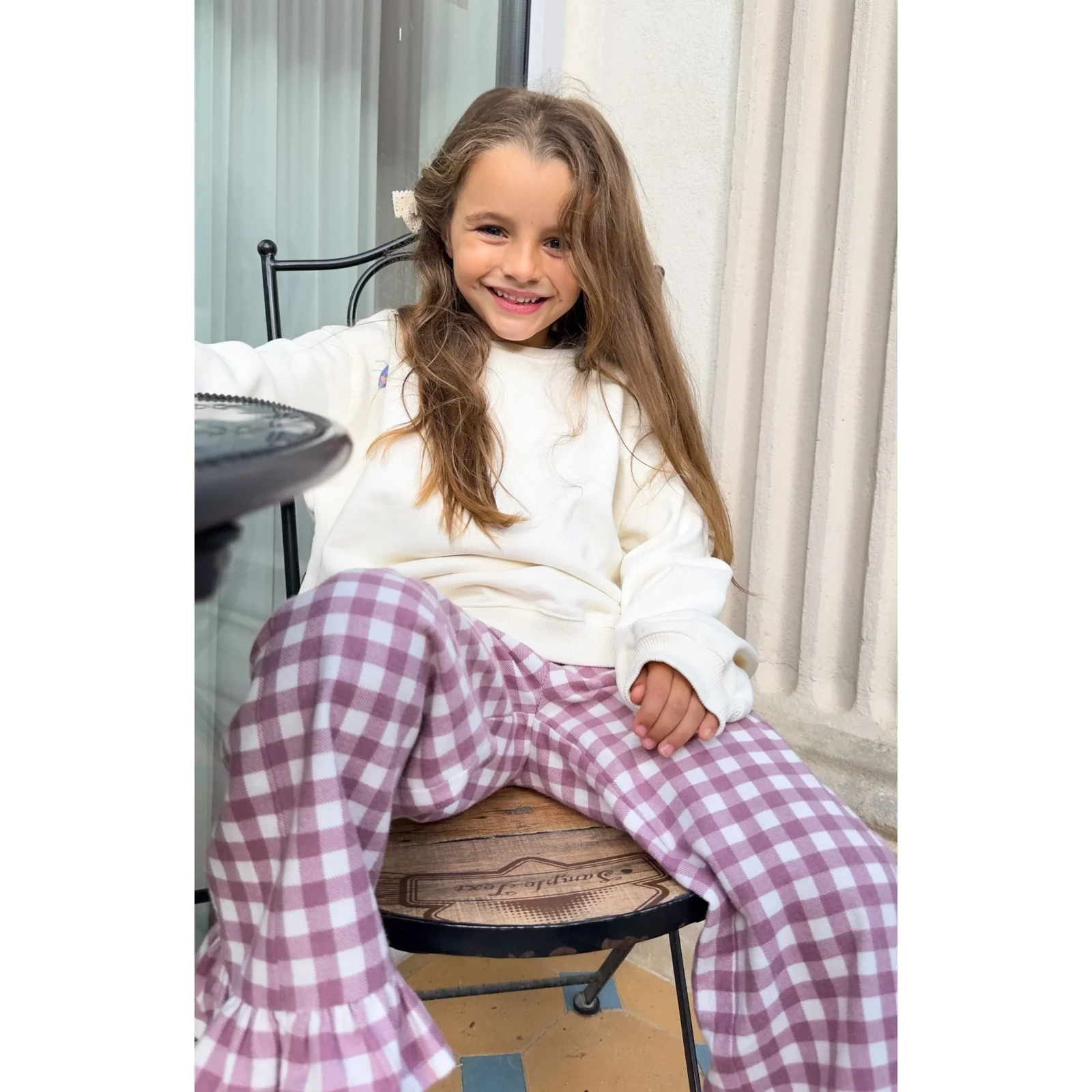 Bawełniane spodnie z falbanką KidStory – Candy pink